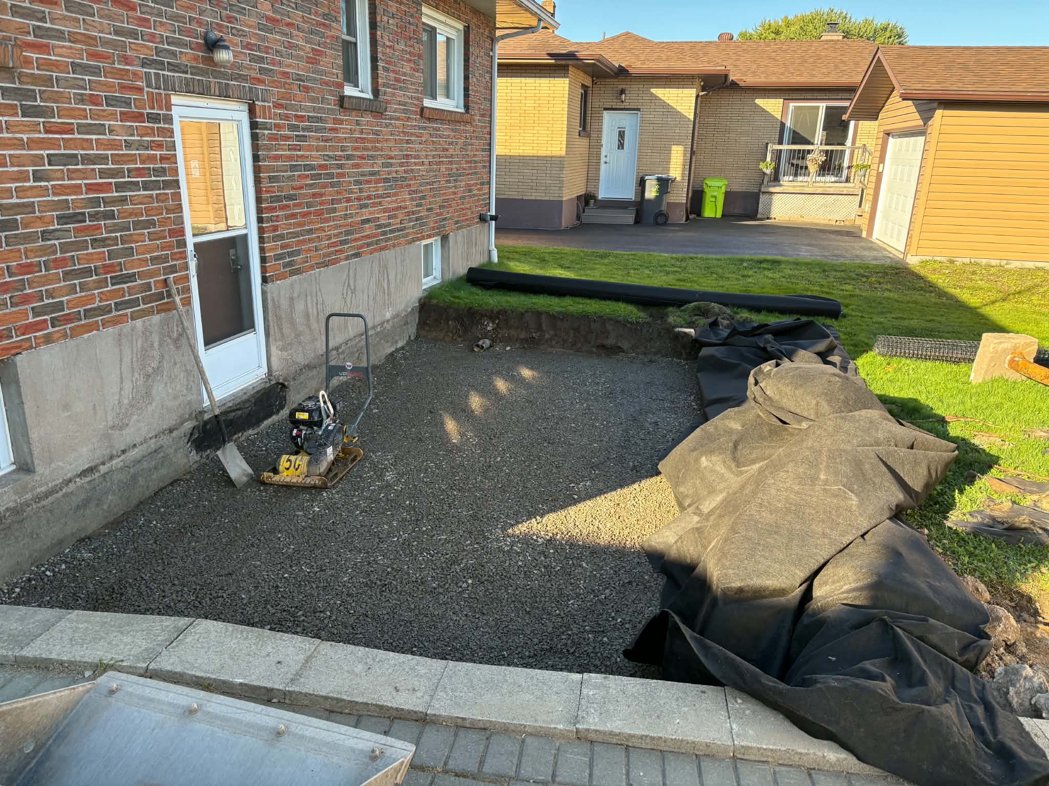 Prepared patio base before PMK installed the pavers